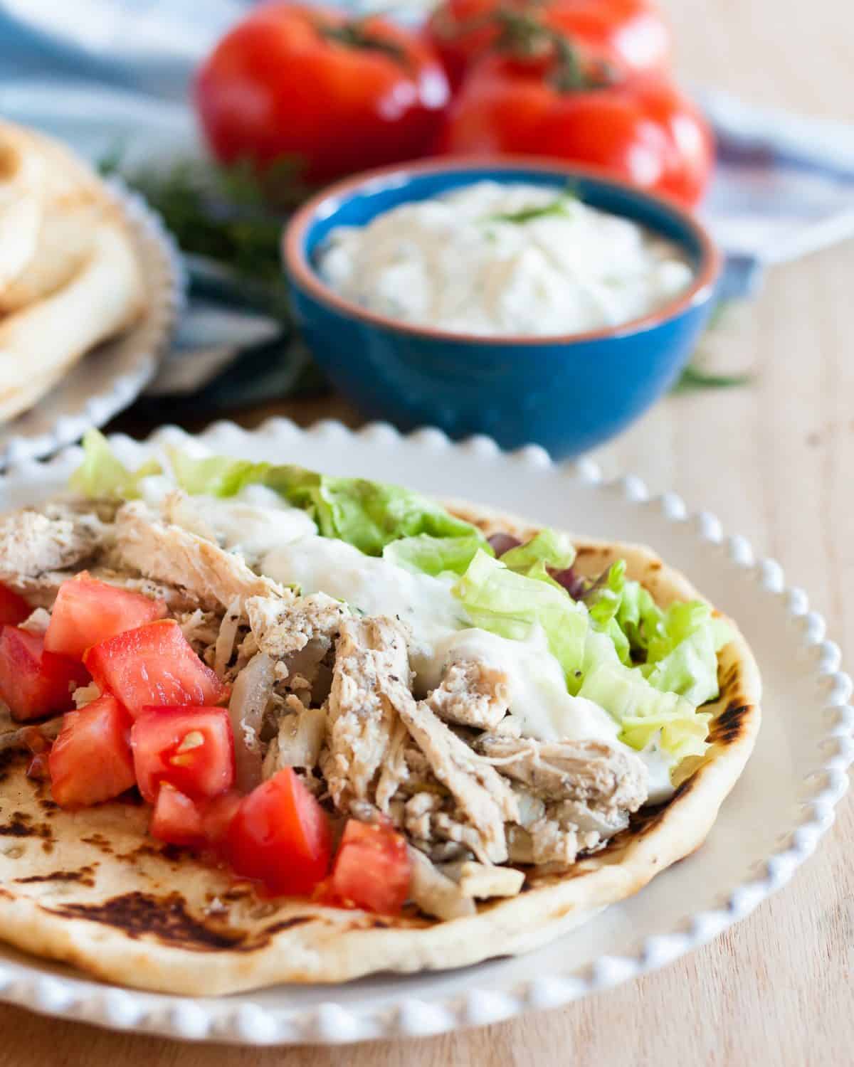 When time is short, but you need an easily customized healthy meal, make some slow cooker chicken gyros! Recipe includes instructions for the instant pot too if you're short on time! * Recipe on goodiegodmother.com