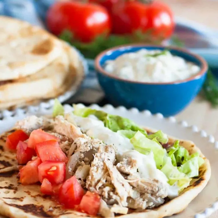 When time is short, but you need an easily customized healthy meal, make some slow cooker chicken gyros! Recipe includes instructions for the instant pot too if you're short on time! * Recipe on goodiegodmother.com