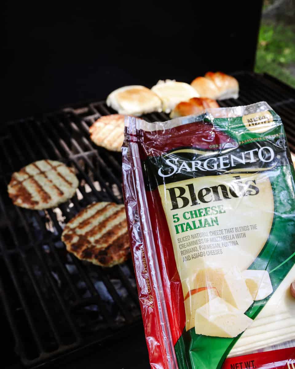 Bring your favorite Italian flavors to the grill this summer with this Italian Grilled Chicken Burgers Recipe! This is a sponsored conversation written by me on behalf of Sargento®. Recipe on GoodieGodmother.com #burgers #summer #grillingrecipes #grilledchicken #chickenrecipe #ad #goodiegodmother