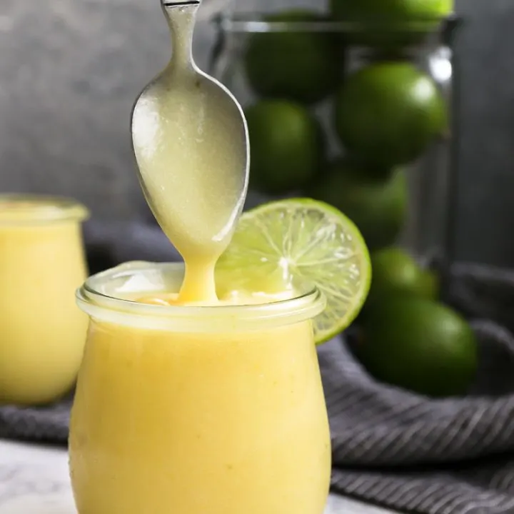 Just the right balance of sweet and sour, this lime curd recipe is a must! Use as a spread for scones or pancakes, or an easy filling for cakes and tarts. Ready in minutes, and you can use now or freeze for later.