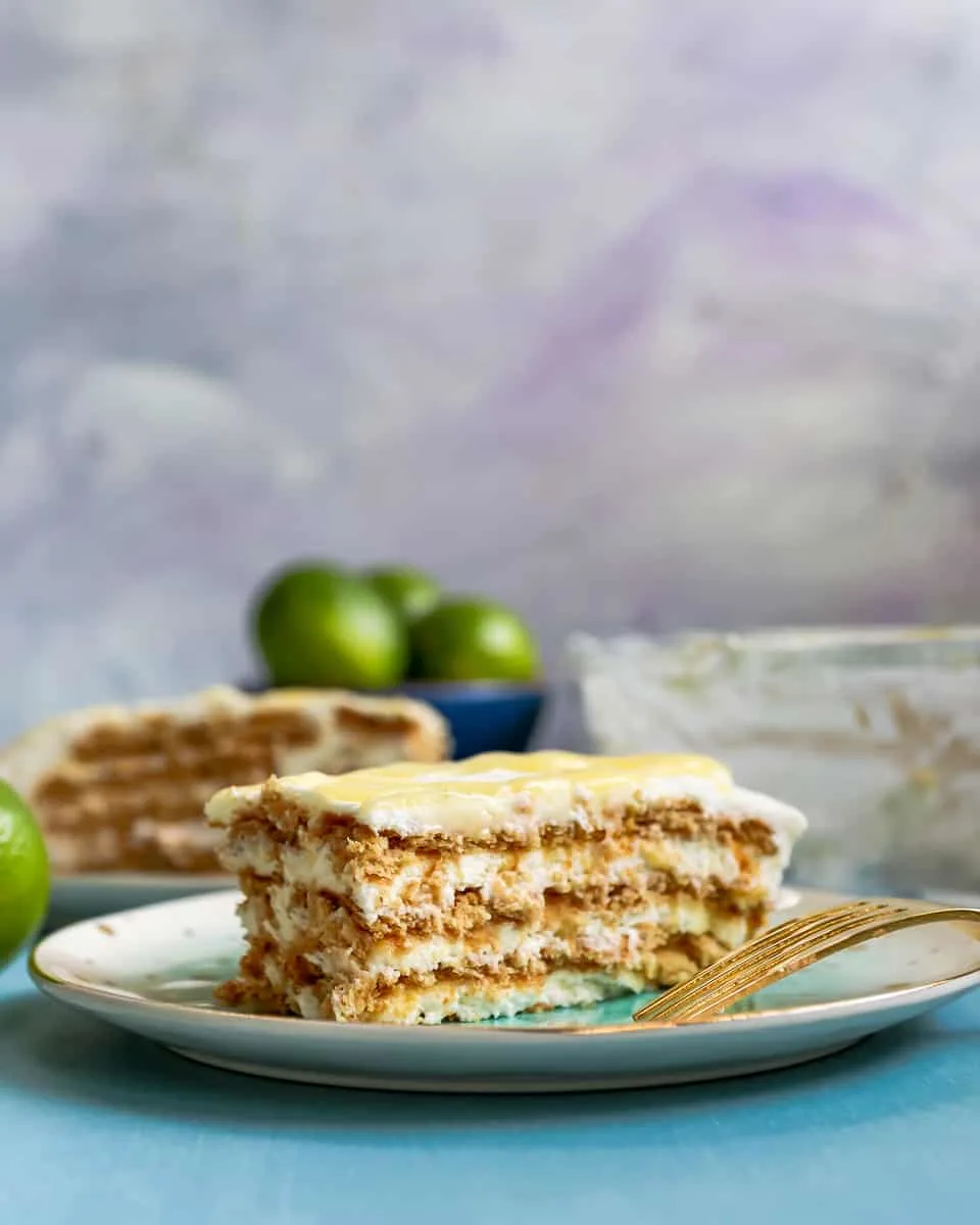 Looking for a no-bake, easy summer dessert to feed a crowd? Look no further than lime icebox cake. Easy to assemble, with all the flavor of a lime (or key lime) pie and none of the work! * Recipe on GoodieGodmother.com #keylime #lime #summerdessert #iceboxcake #nobake #easydessert