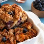 Blueberry Macadamia Nut French Toast Bake with a crunchy streusel topping! French toast casserole is a perfect make ahead breakfast for a crowd. * Recipe on GoodieGodmother.com #breakfast #frenchtoast #makeahead