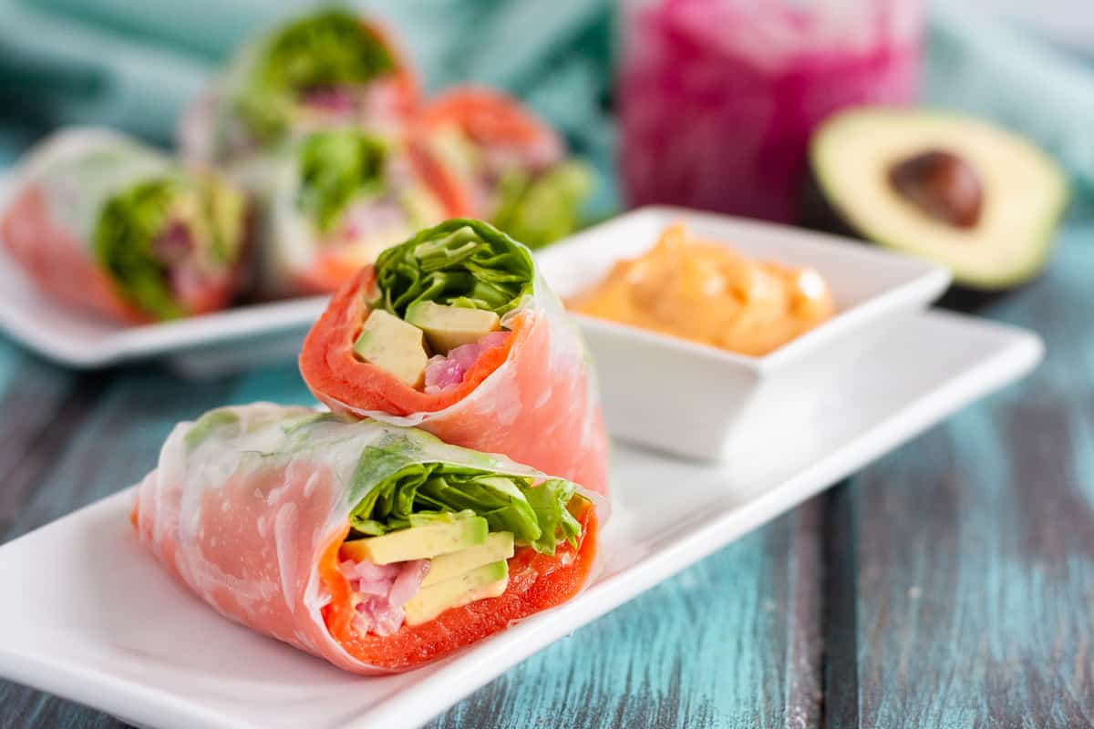 Smoked salmon spring rolls are a quick and easy light recipe you can have ready in minutes! Great for those on low carb diets or for when you just don't feel like bread or a tortilla. * Recipe on GoodieGodmother.com