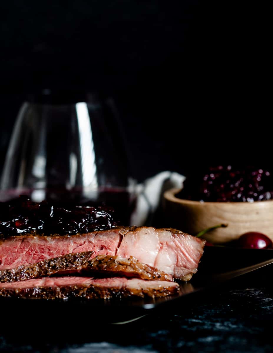 Elevate your steak night with this reverse sear ribeye with cherry onion marmalade. Reverse searing results in juicy ribeye steaks with beautiful color. The cherry onion marmalade is a star supporting condiment - perfect with fresh or frozen cherries! * GoodieGodmother.com