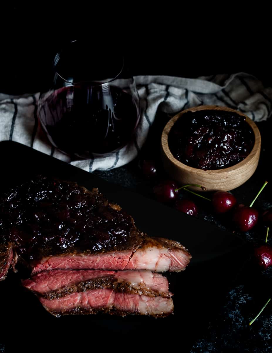 Elevate your steak night with this reverse sear ribeye with cherry onion marmalade. Reverse searing results in juicy ribeye steaks with beautiful color. The cherry onion marmalade is a star supporting condiment - perfect with fresh or frozen cherries! * GoodieGodmother.com