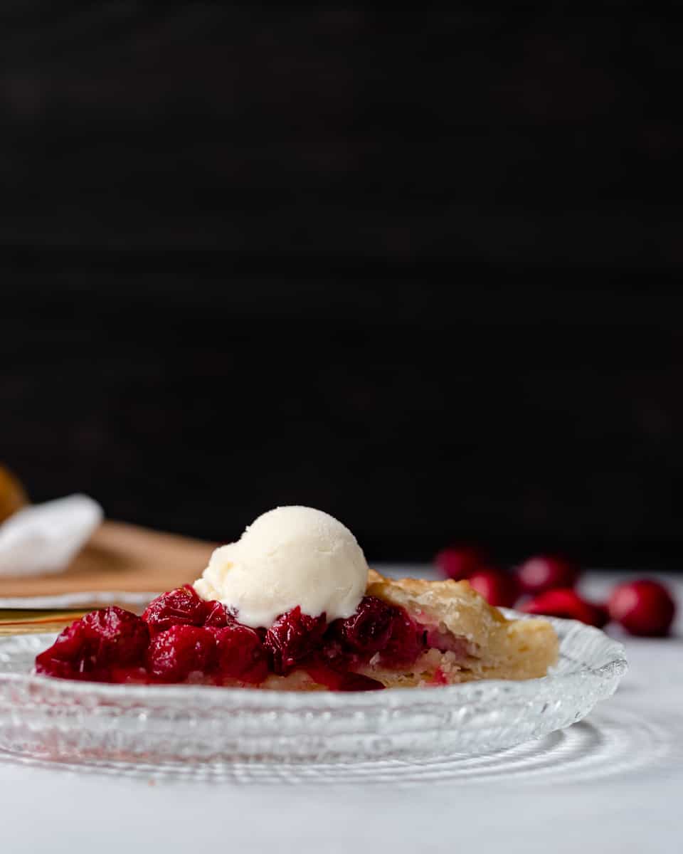 This tart sweet fresh cranberry galette is an easy alternative to a traditional pie. A little less waiting, great balance of fruit and crust, and ice cream's favorite fall friend. * Recipe on GoodieGodmother.com