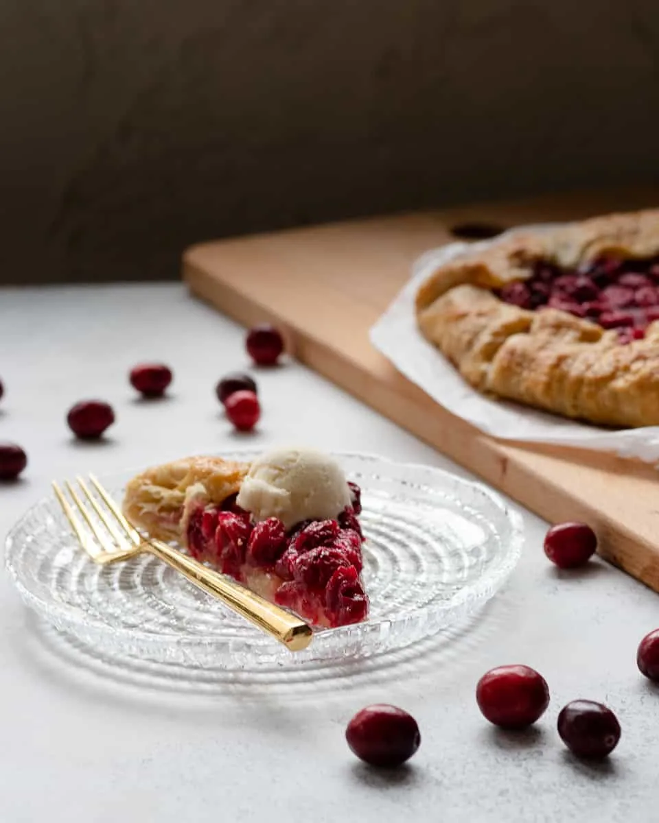 This tart sweet fresh cranberry galette is an easy alternative to a traditional pie. A little less waiting, great balance of fruit and crust, and ice cream's favorite fall friend. * Recipe on GoodieGodmother.com