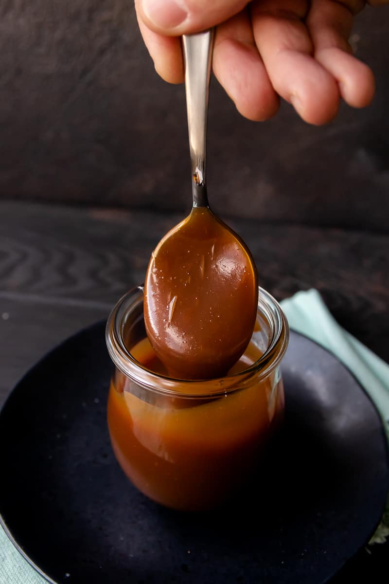 Add a unique twist to your caramel sauce with the addition of a little Irish cream liquor! This caramel sauce recipe stays soft, even in the refrigerator! * GoodieGodmother.com