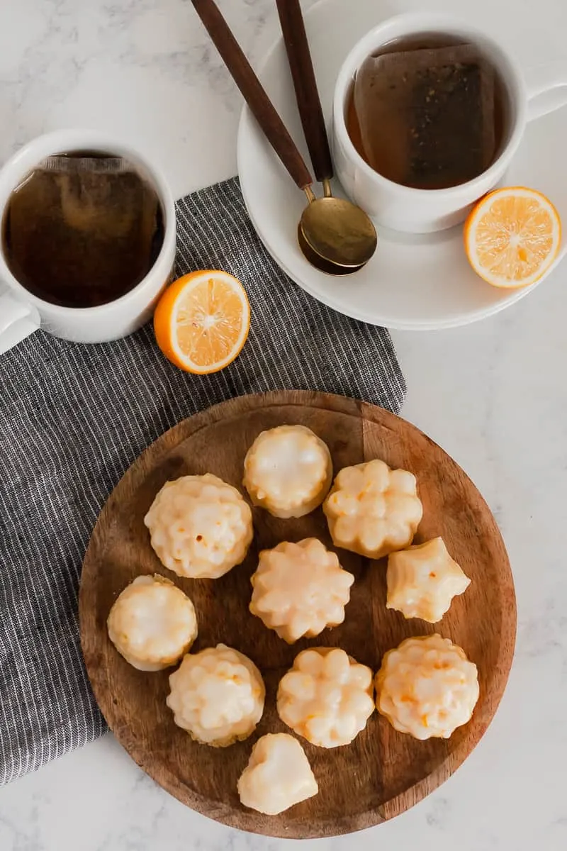 A delicate lemon ricotta pound cake is perfect for baking in mini! Enjoy this Meyer Lemon Pound Cake Bites recipe with a cup of your favorite tea.  * GoodieGodmother.com