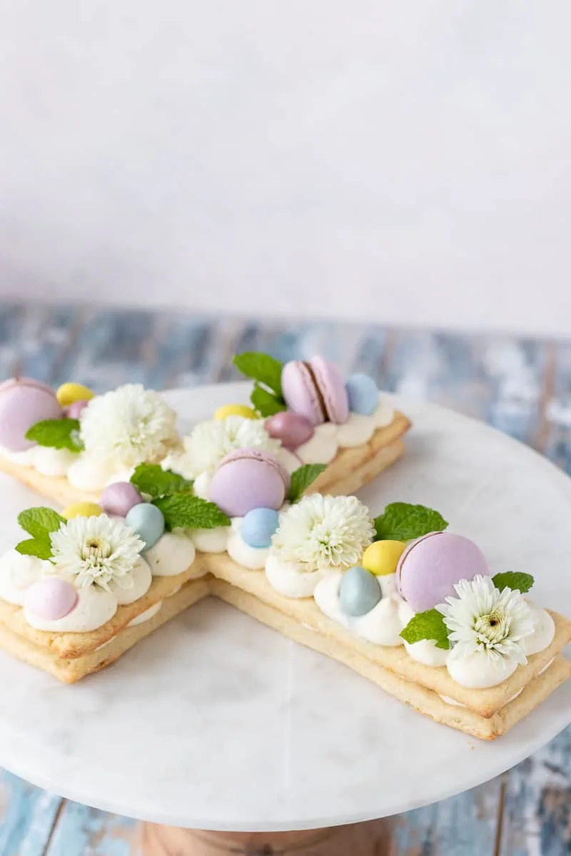 Make this beautiful Easter cream tart for your spring table! Post includes a video tutorial with assembly tips for beautiful results every time. ﻿ * Recipe on GoodieGodmother.com