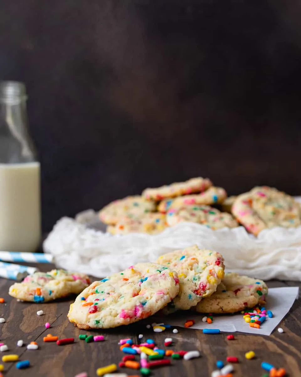 Soft and tender, these cake batter condensed milk cookies prove everything is better with sprinkles! This is a great recipe to use up leftover condensed milk. * Recipe on GoodieGodmother.com