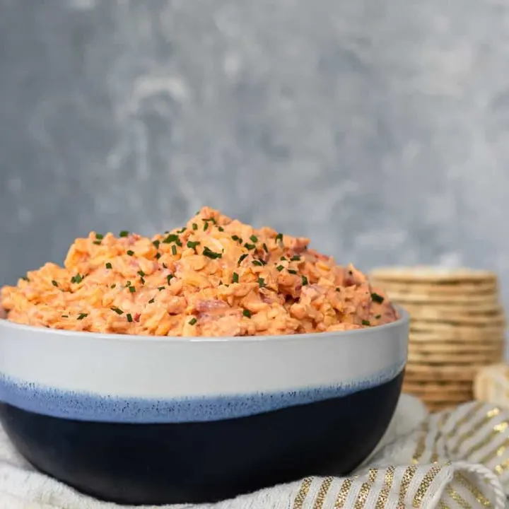 This delicious, moderately spicy pimento cheese recipe is so easy to make and enjoy! It's great on sandwiches, crackers, and more... * Recipe on GoodieGodmother.com