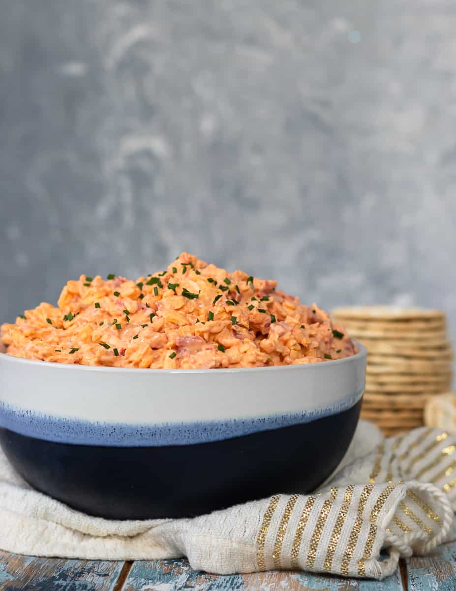 This delicious, moderately spicy pimento cheese recipe is so easy to make and enjoy! It's great on sandwiches, crackers, and more... * Recipe on GoodieGodmother.com