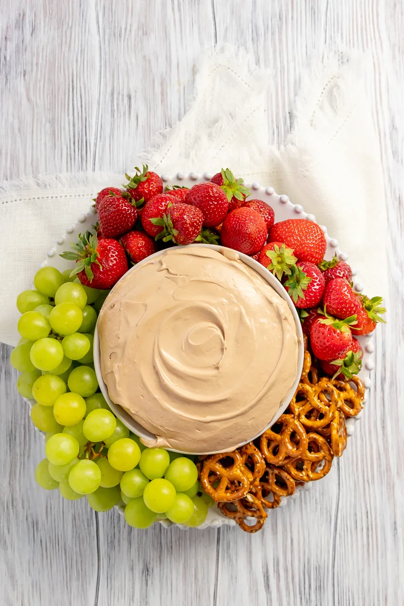 overhead picture of fruit dip to show how pretty a platter would look as part of a party or potluck dessert spread
