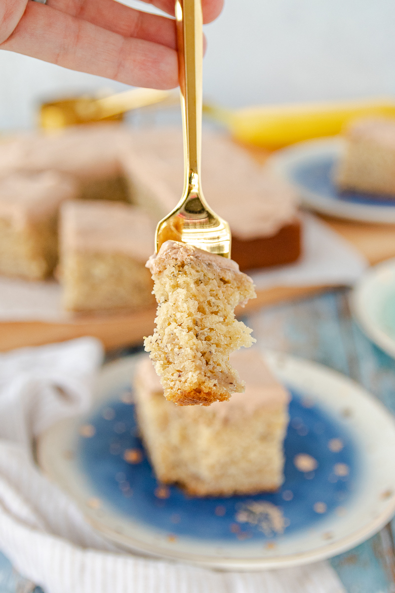 bite of banana cake on a fork close to the camera