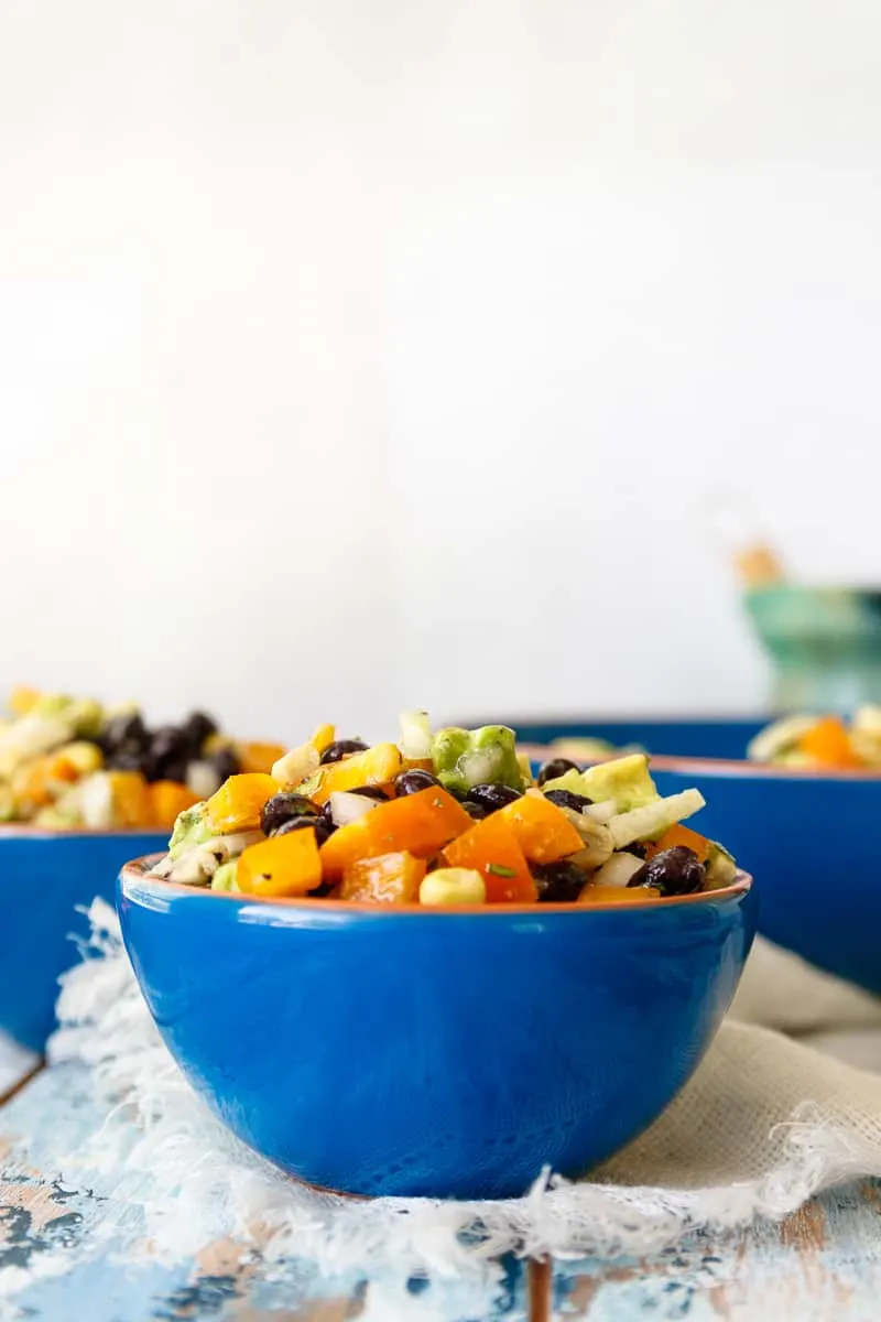 Whip up a delicious and satisfying side dish with mostly pantry and freezer staples! This easy black bean and corn salad recipe is a staple for make-ahead lunches, a quick side for taco night, or an easy picnic or bbq salad. 

#beansalad #summersalad #easysaladrecipe #texmex #sidedish #easyrecipe