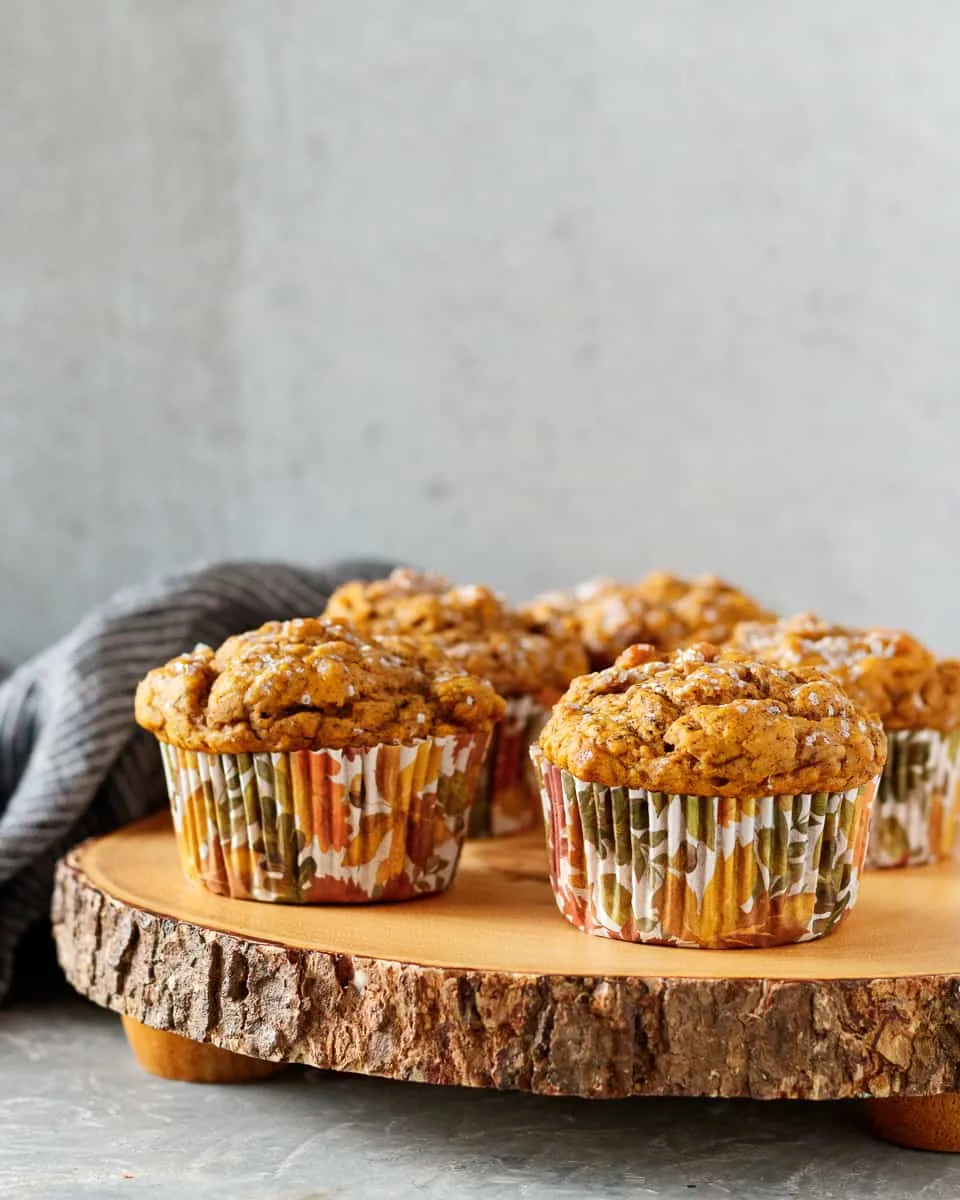 small batch vegan pumpkin muffins on a cake platter