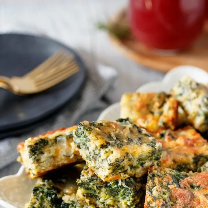 easy spinach squares piled on a plate