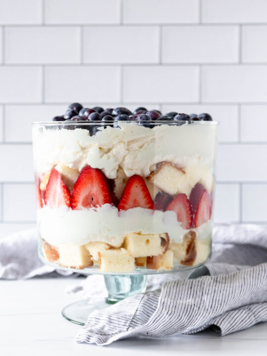 assembled summer berry trifle in a large trifle dish