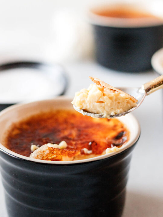 spoon lifting out of the creme brulee, ready to eat!