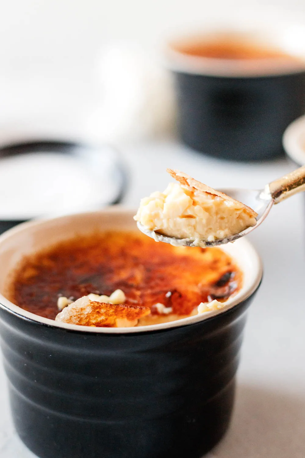 spoon lifting out of the creme brulee, ready to eat! 