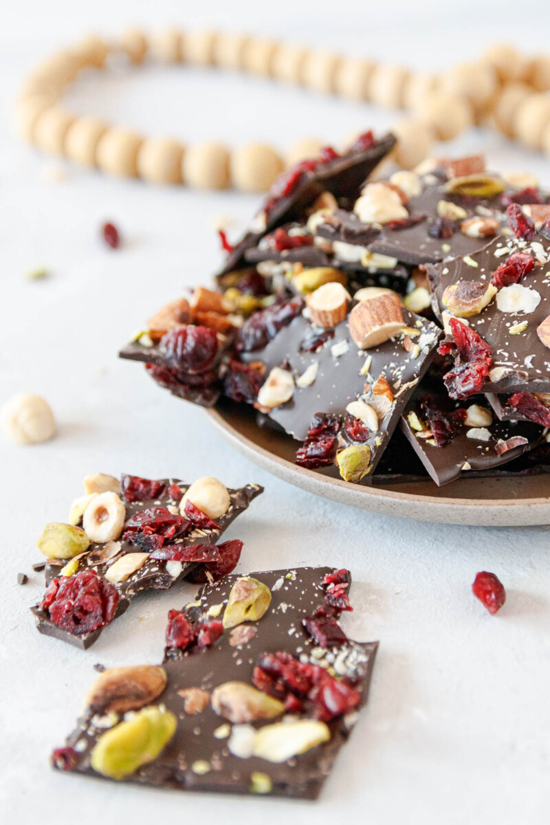close up of the bark to show the texture and color mix of the dried cranberries, pistachios, and almonds