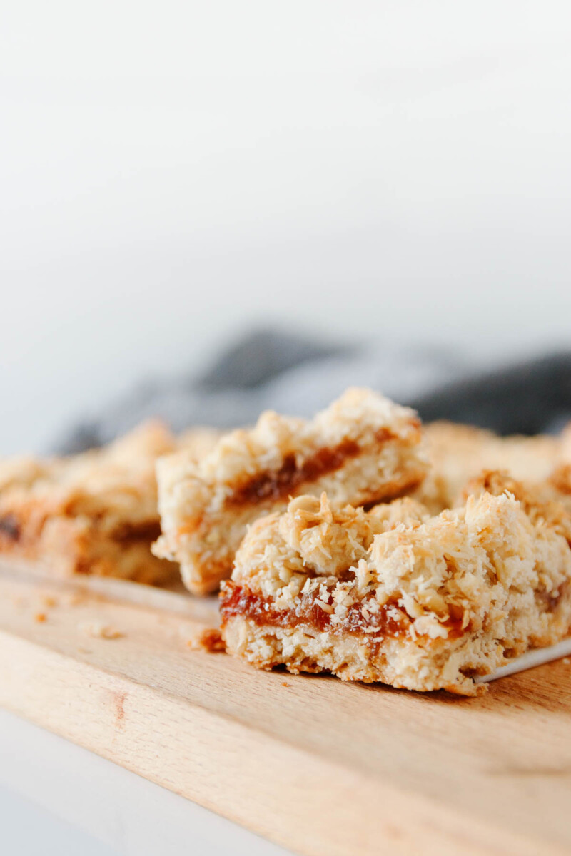 close up of the cut bars so show the texture and toasted coconut flakes!